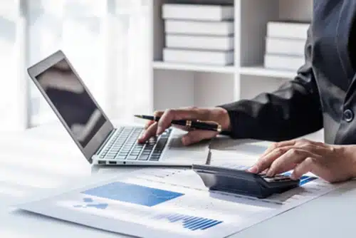 Person on the computer doing Tax Assessments.
